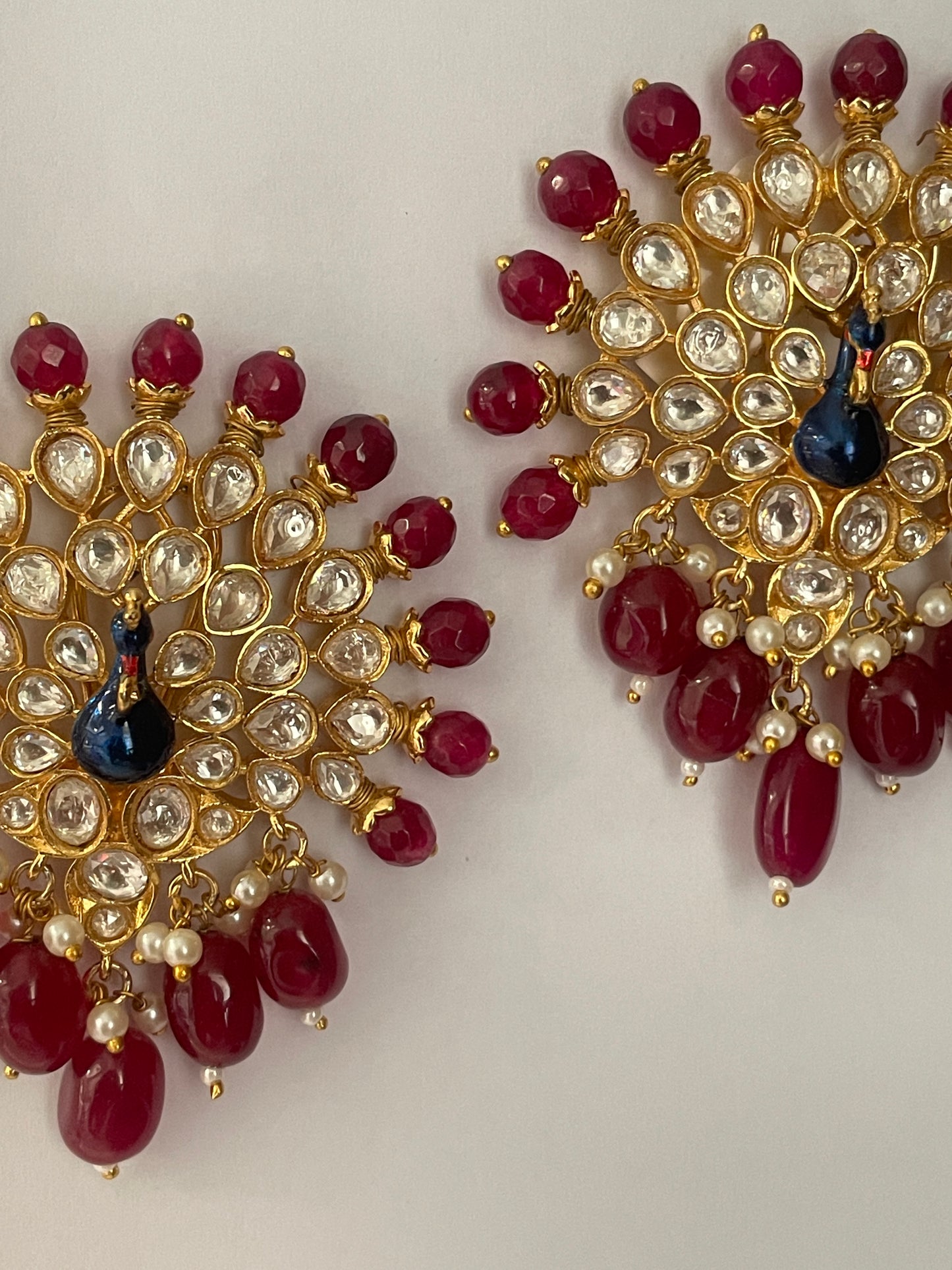 Peacock Motif Kundan Studs with Red Beads