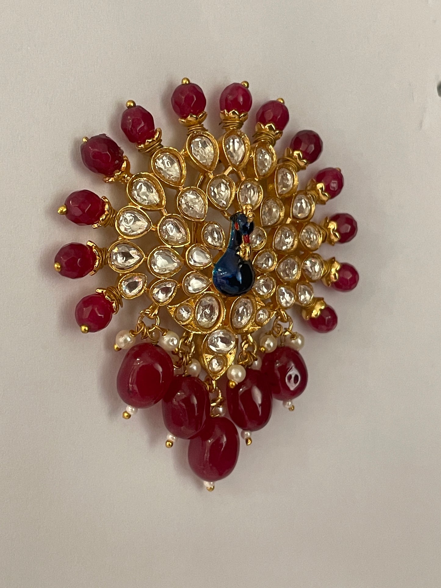 Peacock Motif Kundan Studs with Red Beads