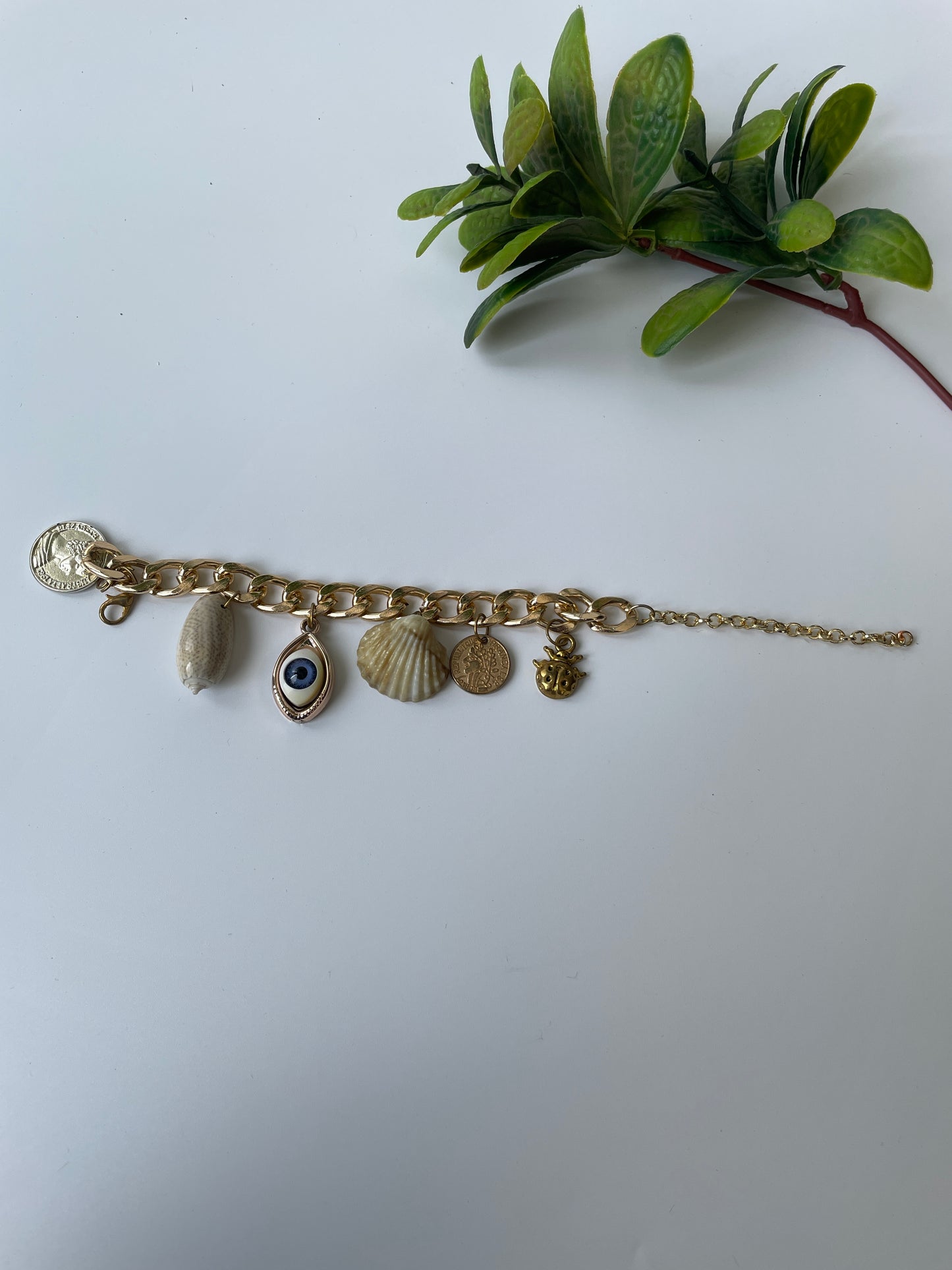 Gold Finish Multiple Charm Bracelet