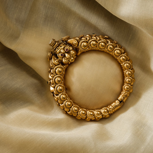 Gold Finish Carved Temple Bangle