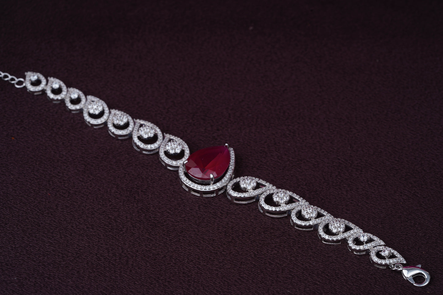 Zircon Bracelet with Red Pear Center Stone