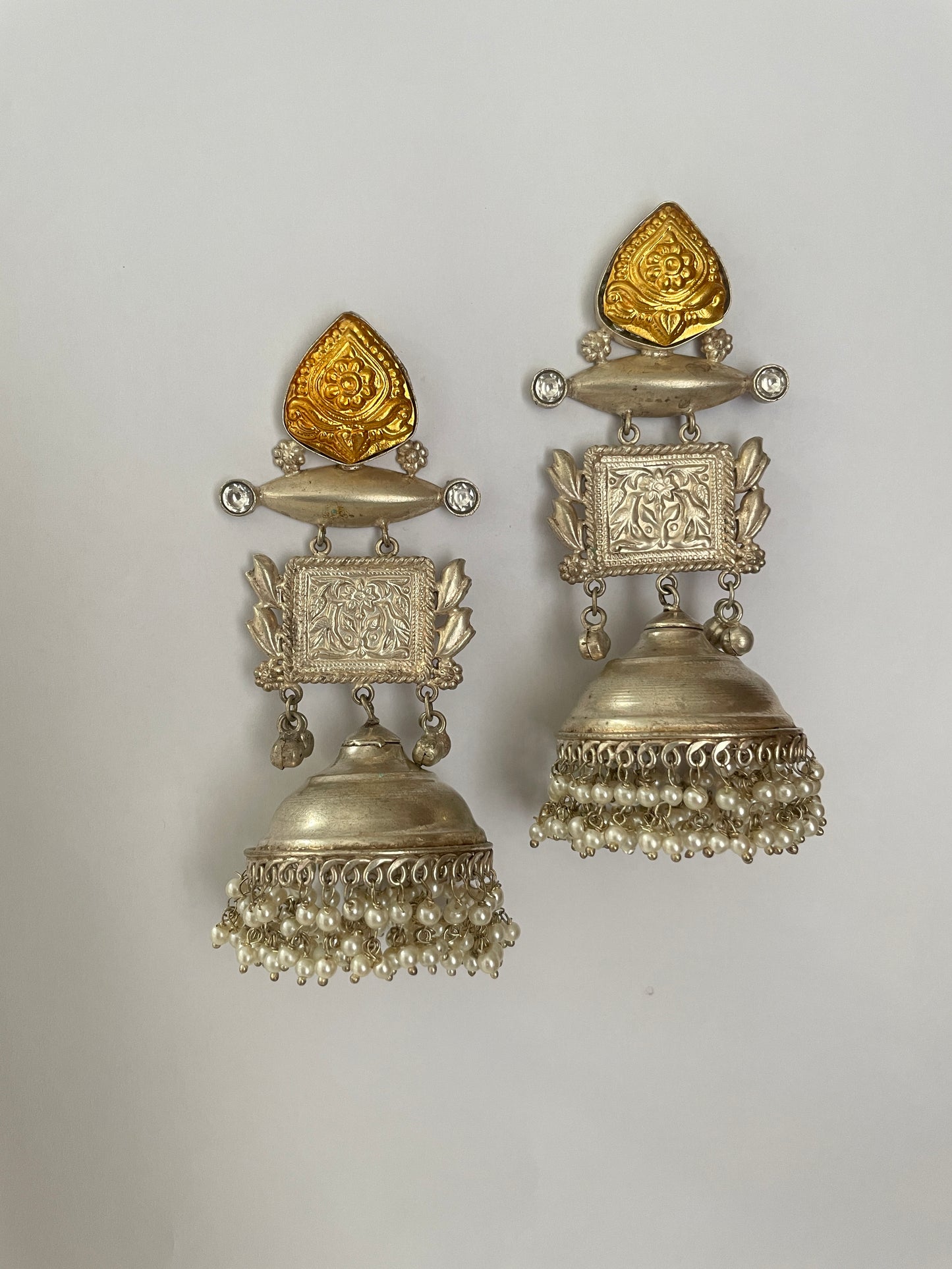 Oxidised Jhumka with gold detailing in German silver