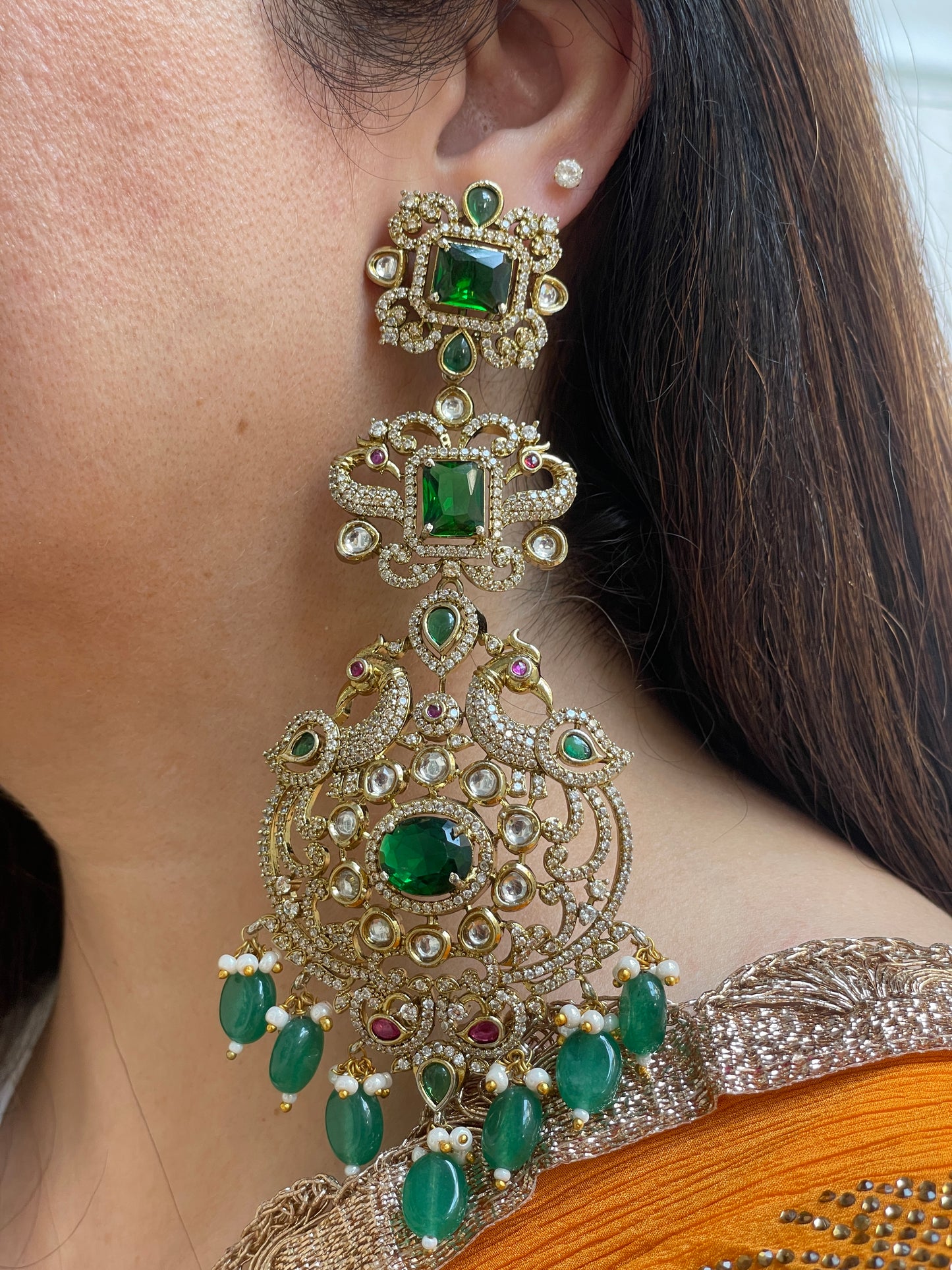 Stone Studded Long Earrings with Green Stones and Beads