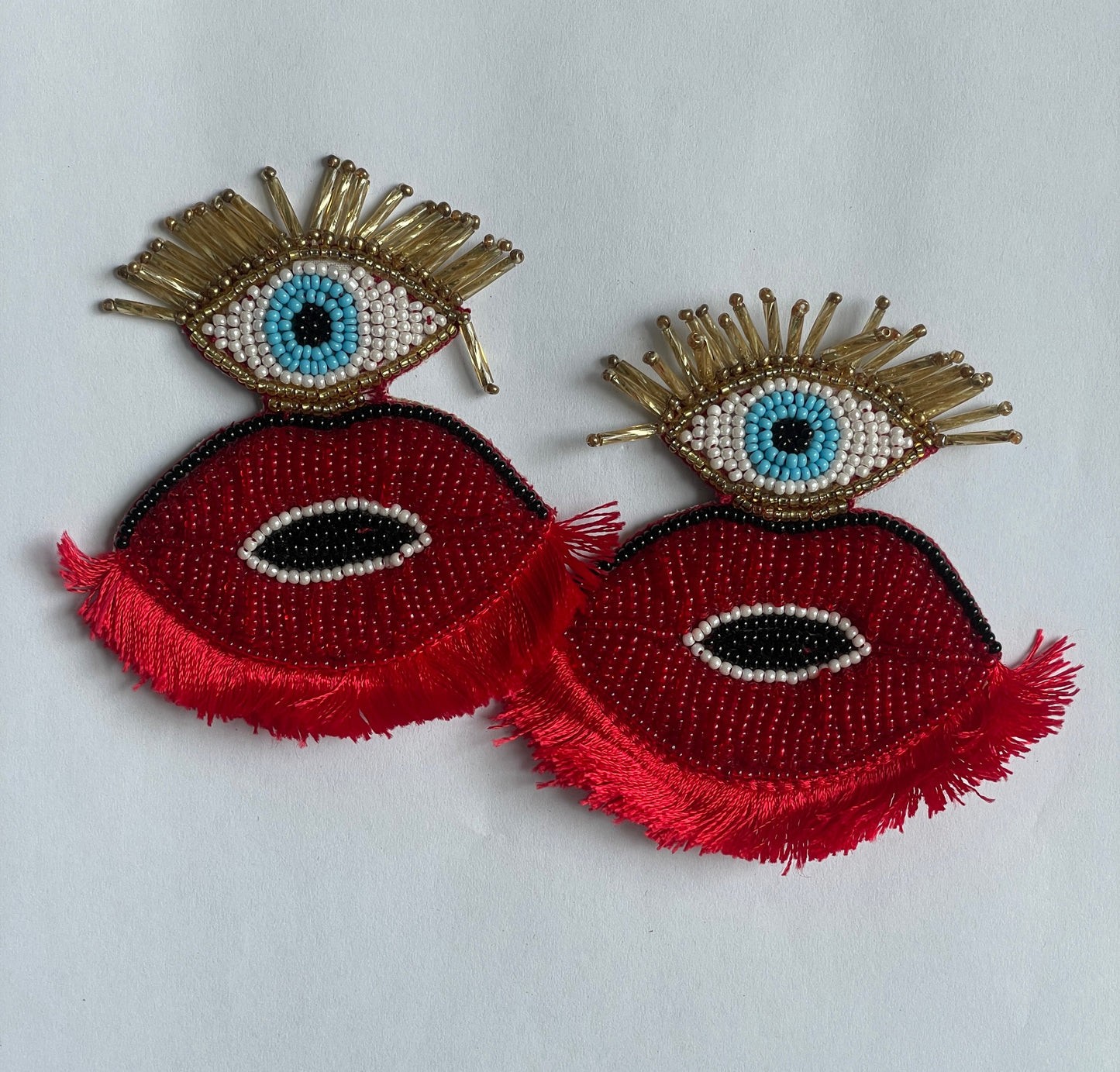 Beaded Evil Eye Tassel Earrings