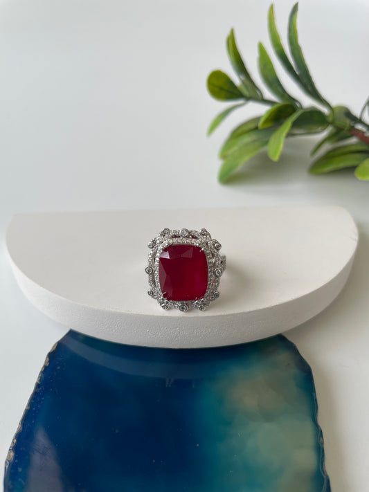 Red Center Stone and Zircon Ring