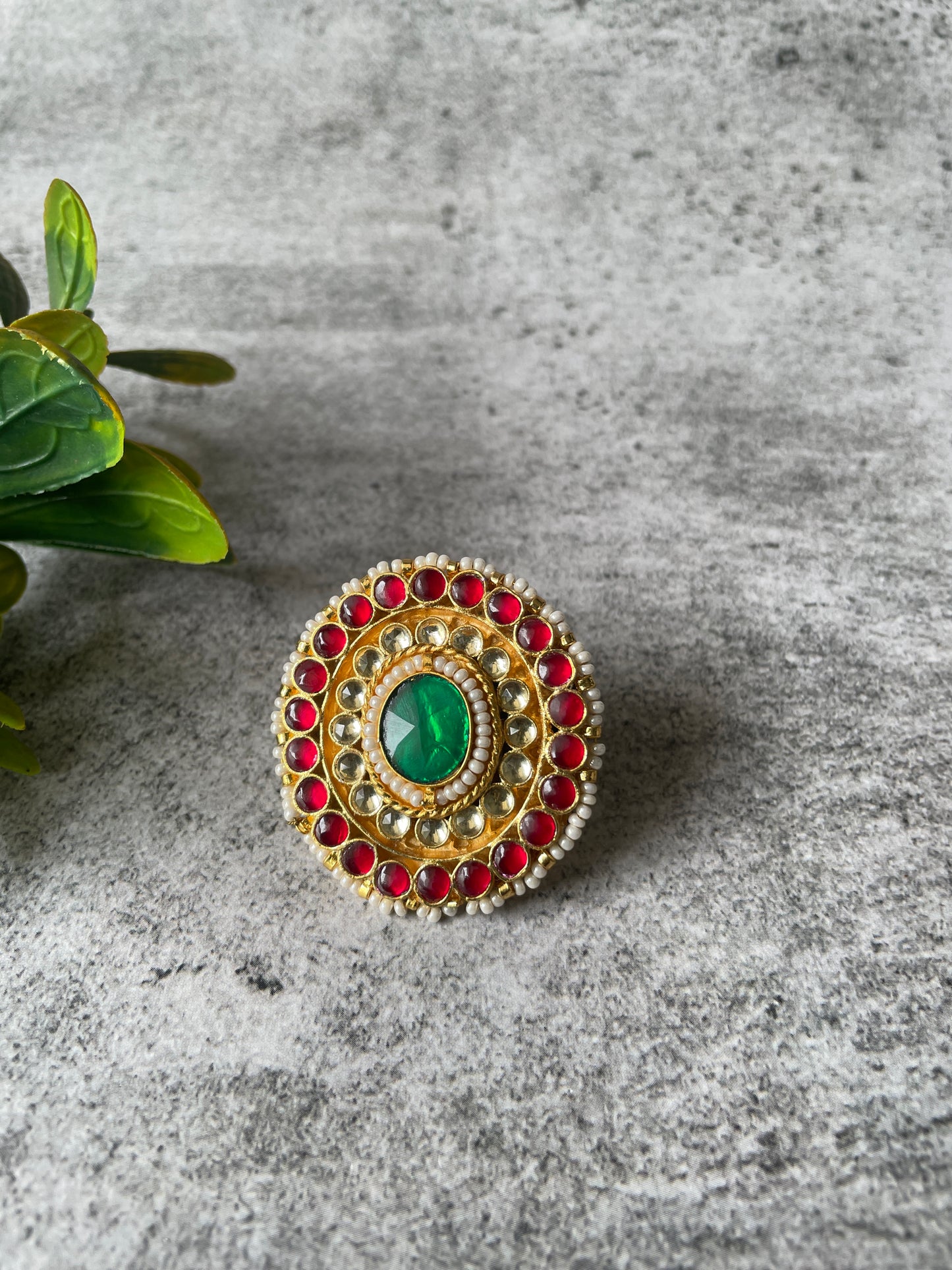 Gold Finish Kundan Ring with Red and Green Stones