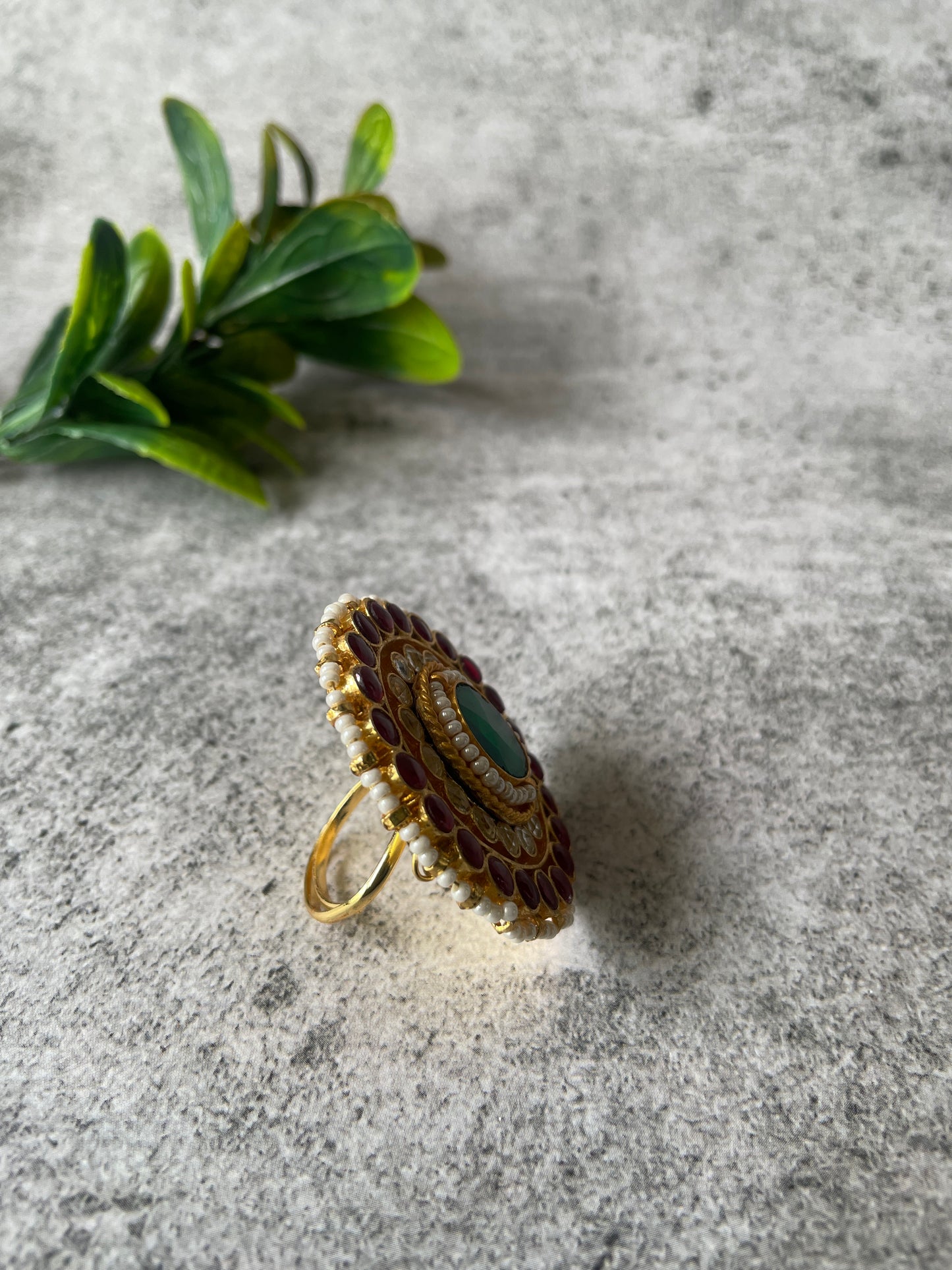 Gold Finish Kundan Ring with Red and Green Stones