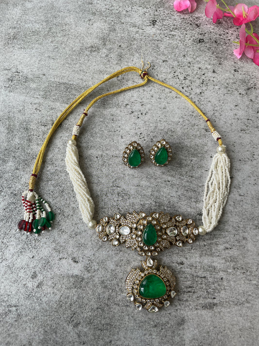 Necklace Set with Antique Finish Kundan and Vibrant Stone studded with Pearls