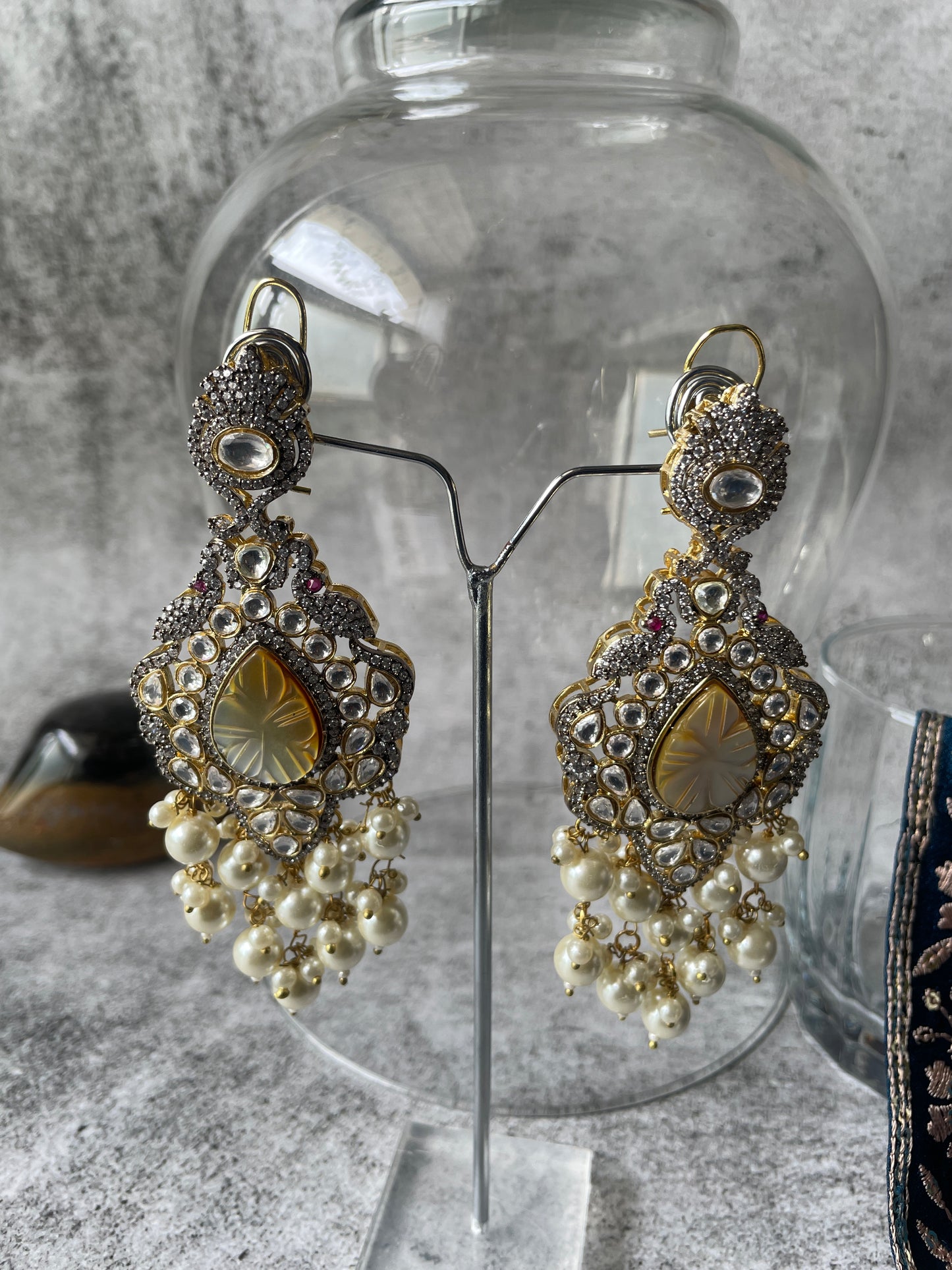 Long Pearl Necklace Paired with Matching Carved Pearl Earrings