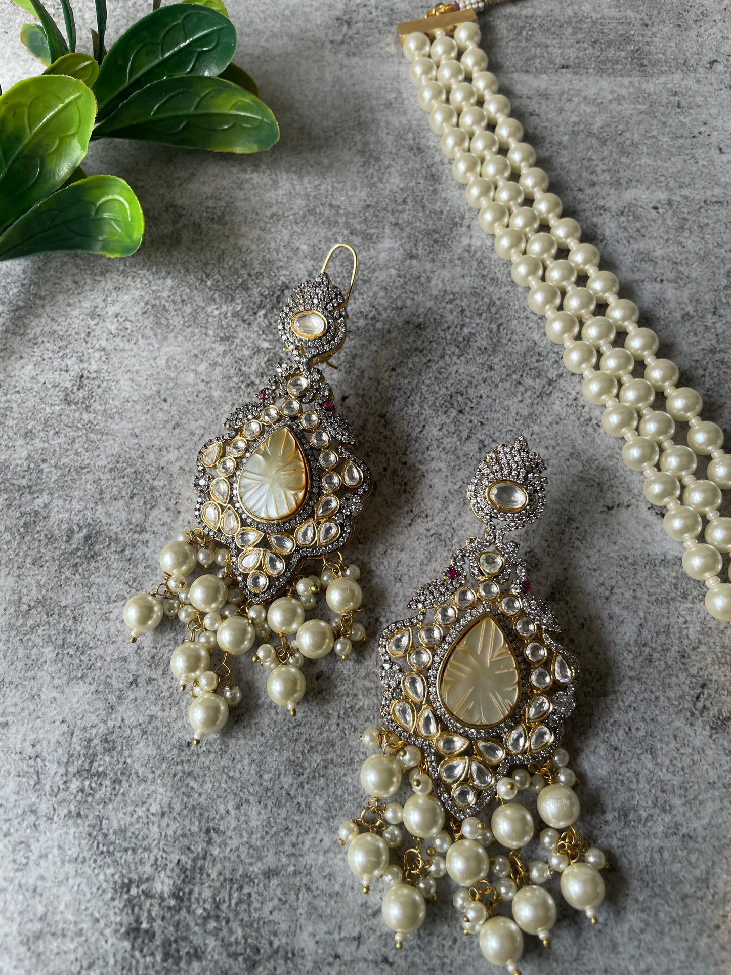 Long Pearl Necklace Paired with Matching Carved Pearl Earrings